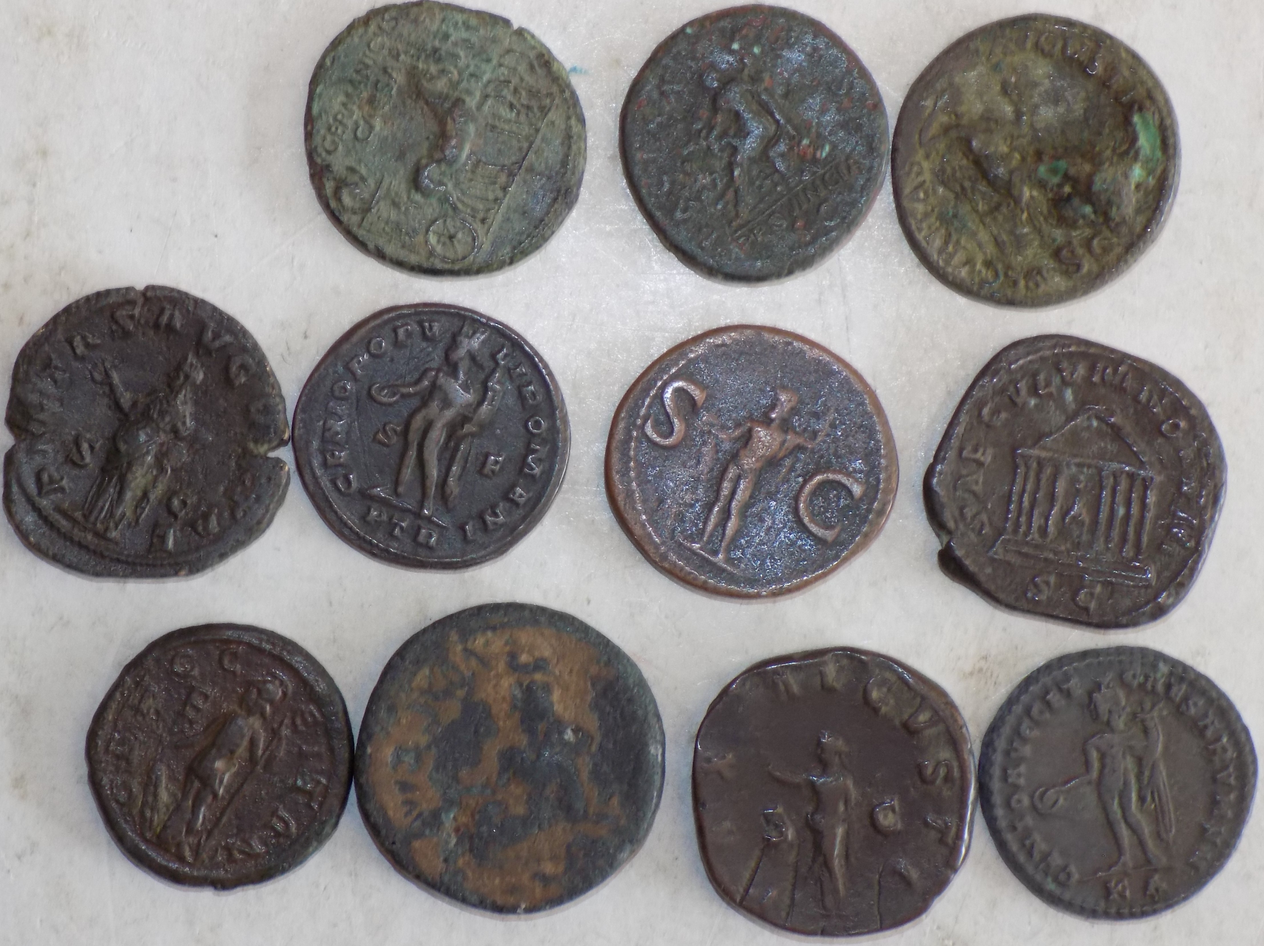 Eleven earlier Roman bronze coins. - Image 2 of 2