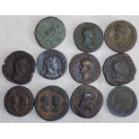 Eleven earlier Roman bronze coins.