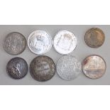 Eight World silver coins.