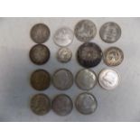 Six U.S.A. 1964 half dollars, a Chile Peso (mounted) and other silver coins.