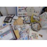 Miscellaneous stamps, first day covers, albums and bags of loose all contained in a large box.