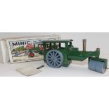 A Minic clockwork steamroller the tin plate body with plastic wheels, no key.