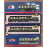 Eight boxed carriages by Bachmann.