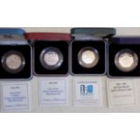 Four silver proof 50 pence coins:- 1994 D Day (2) 2000 libraries and 1993 EU.