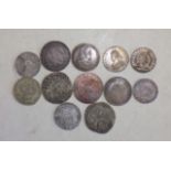 Twelve 17th to 19th century silver coloured European coins, probable copies, viewing recommended.