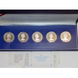 "The Coronation Jubilee Crown Coins" a set of five crown size coins.