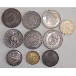 U.S.A. dollars:- 1884, 1923, together with eight silver and other coins.