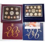 Two British proof year sets each with card outer packaging,