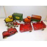 A group of heavy pressend steal toys, circa 1930's by Wyandotte, a Hoppy wagon,LEP transport wagon,