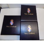 A collection of New Zealand in three Stanley Gibbons PEG fitting hingless albums from 1898 to 1995,