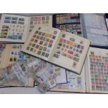 Two albums of South American stamps, a well filled Strand album,