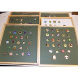 Several hundred bowling badges contained on forty five boards each in wood frame.