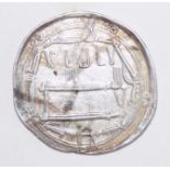 An Islamic silver hammered coin, Dirham.