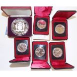 A Jamaica $25 proof silver coin, together with five Canada silver dollars.