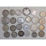 Twenty four mainly silver World coins.