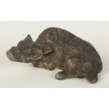 A Chinese cast metal figure of a recumbent ox, possibly a scroll weight, length 6.5cm.