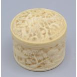 A Chinese Canton carved ivory cylindrical box and cover, circa 1900,