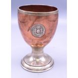 A copper and silver plated goblet, early 20th century, engraved 'Ranelagh' below a circular crest,