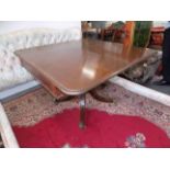 A George III mahogany pedestal extending dining table, with one leaf, height 76cm, full length 164.