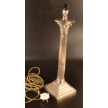 A tall Corinthian column silver table lamp by Walker & Hall, Sheffield 1911, height 47cm.