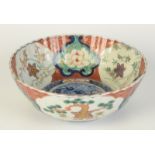 A Japanese Imari bowl, 19th century, character marks to underside, height 9.5cm, diameter 25cm.
