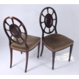 A set of four Edwardian mahogany dining chairs,