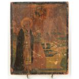 A 19th century icon, painted with the figure of a saint, 17.8 x 14.2cm.