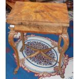 A Victorian burr walnut games table,