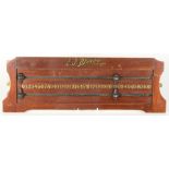 An E.J. Riley Limited Accrington wooden snooker score board, height 19.5cm, width 61.5cm.