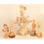 A continental porcelain centrepiece, height 31cm,