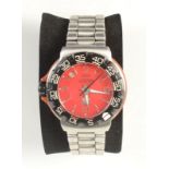 A Tag Heuer Formula 1 Ferrari red gentleman's wristwatch with sweep seconds and calendar aperture