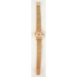 A Longines ladies 18ct gold cased wristwatch with 13.15V movement on woven 18ct gold bracelet.