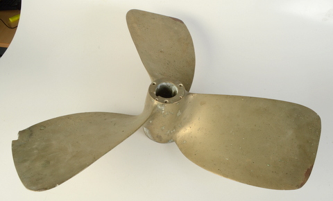 A large brass propeller, diameter 70cm.