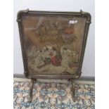 A metamorphic firescreen occasional table, gilt framed on splay feet, height as firescreen 86cm,