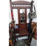 A Victorian mahogany hall stand, with a central rectangular mirrored plate,