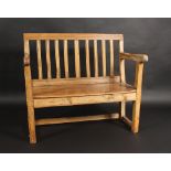 A pine country made seat, the vertical bar back,