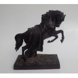 A Russian cast iron model of a rearing Marley horse, on a plinth base, inscribed '1969 CCCP',