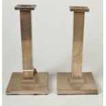 A pair of Art Deco plain, square section candlesticks, height 20.7cm.