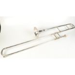 A silver plated Hawkes & Son trombone, engraved Excelsior Sonorous Glass Denman Street,