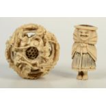 A Chinese ivory puzzle ball, 19th century, diameter 5.5cm and a Japanese bone netsuke, height 5.5cm.