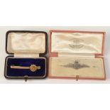 An RAF ladies silver brooch in Goldsmiths & Silversmiths case, together with a 9ct gold bar brooch.