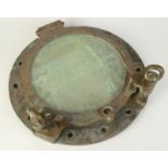 A brass 50cm porthole with hinged window.