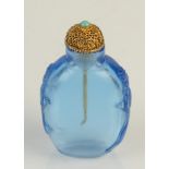 A Peking blue glass snuff bottle carved with dragon sides, height 6.5cm.