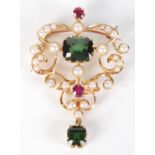 A Belle Époque high purity gold pendant/brooch set with pearls, tourmaline and rubies, height 41mm,