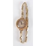 A ladies 18ct gold cased Syren wristwatch on 18ct gold expanding bracelet.