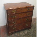 A George III mahogany chest of drawers, with four long graduated drawers on bracket feet,