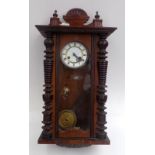 A Victorian mahogany wall clock, height 74cm.