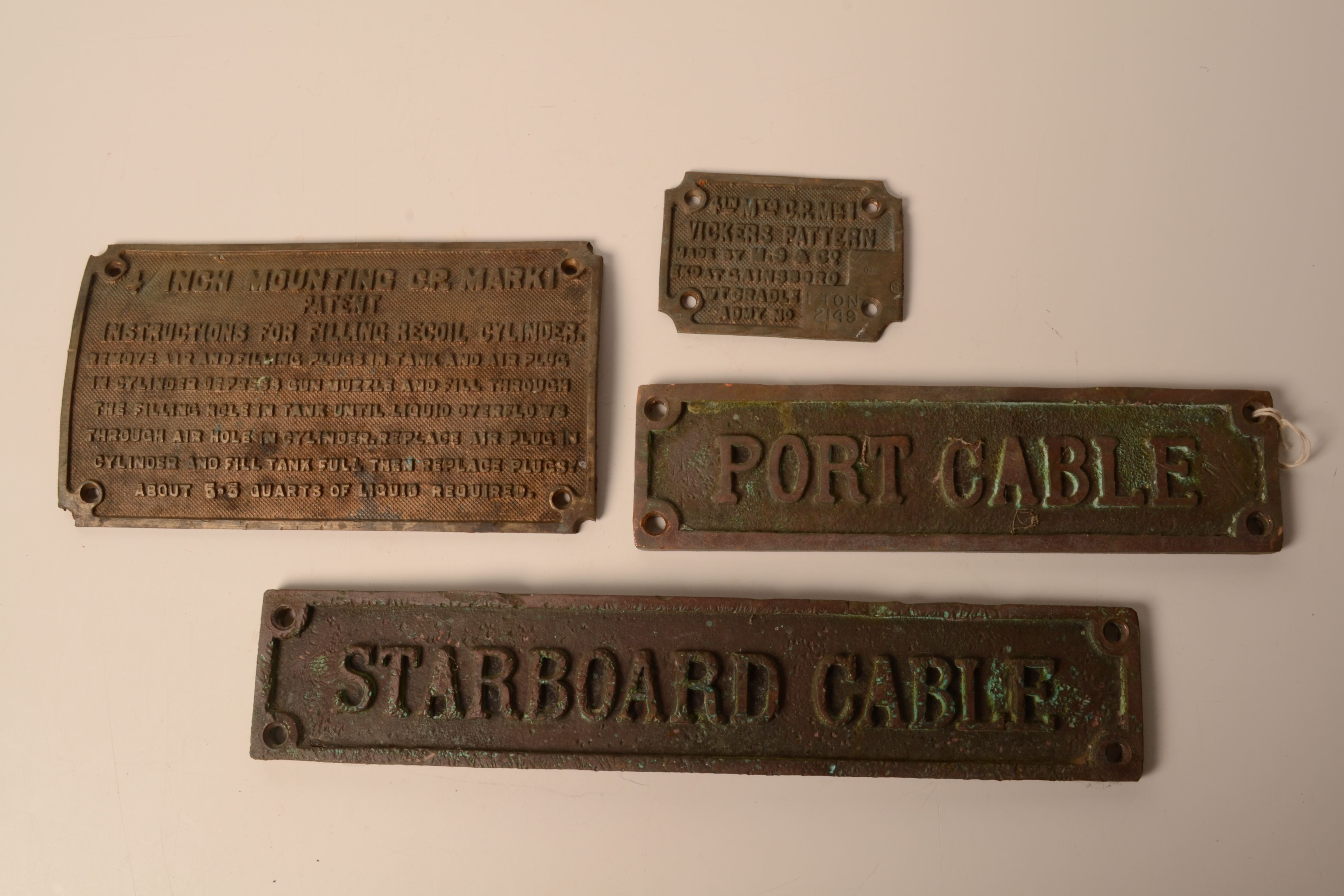 Two cast iron signs inscribed Port Cable and Starboard Cable, lengths 25.5cm and 34.