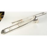 A silver plated Hawkes & Son trombone, length 110cm.