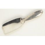 A Tiffany silver shoe horn the handle engraved with scrolling flowers and foliage, length 6.